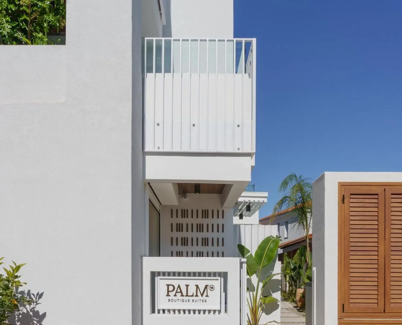 Отель Palm Boutique Suites Пефкохори