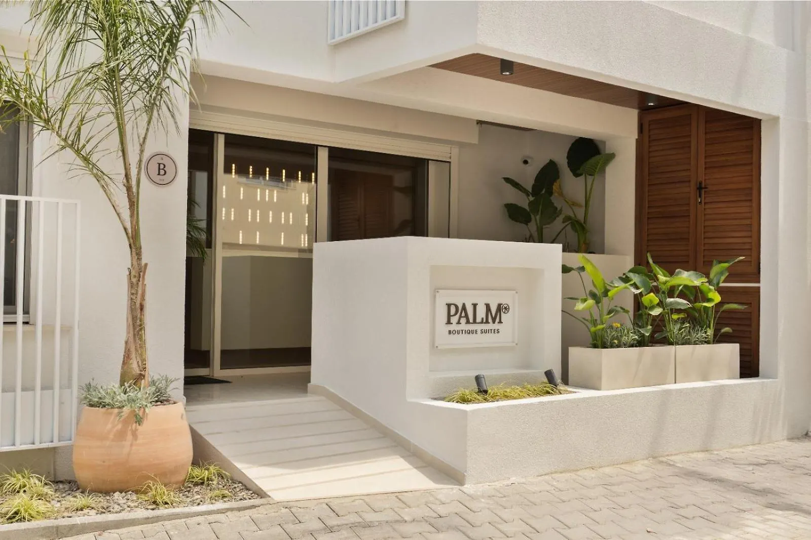 Отель Palm Boutique Suites Пефкохори